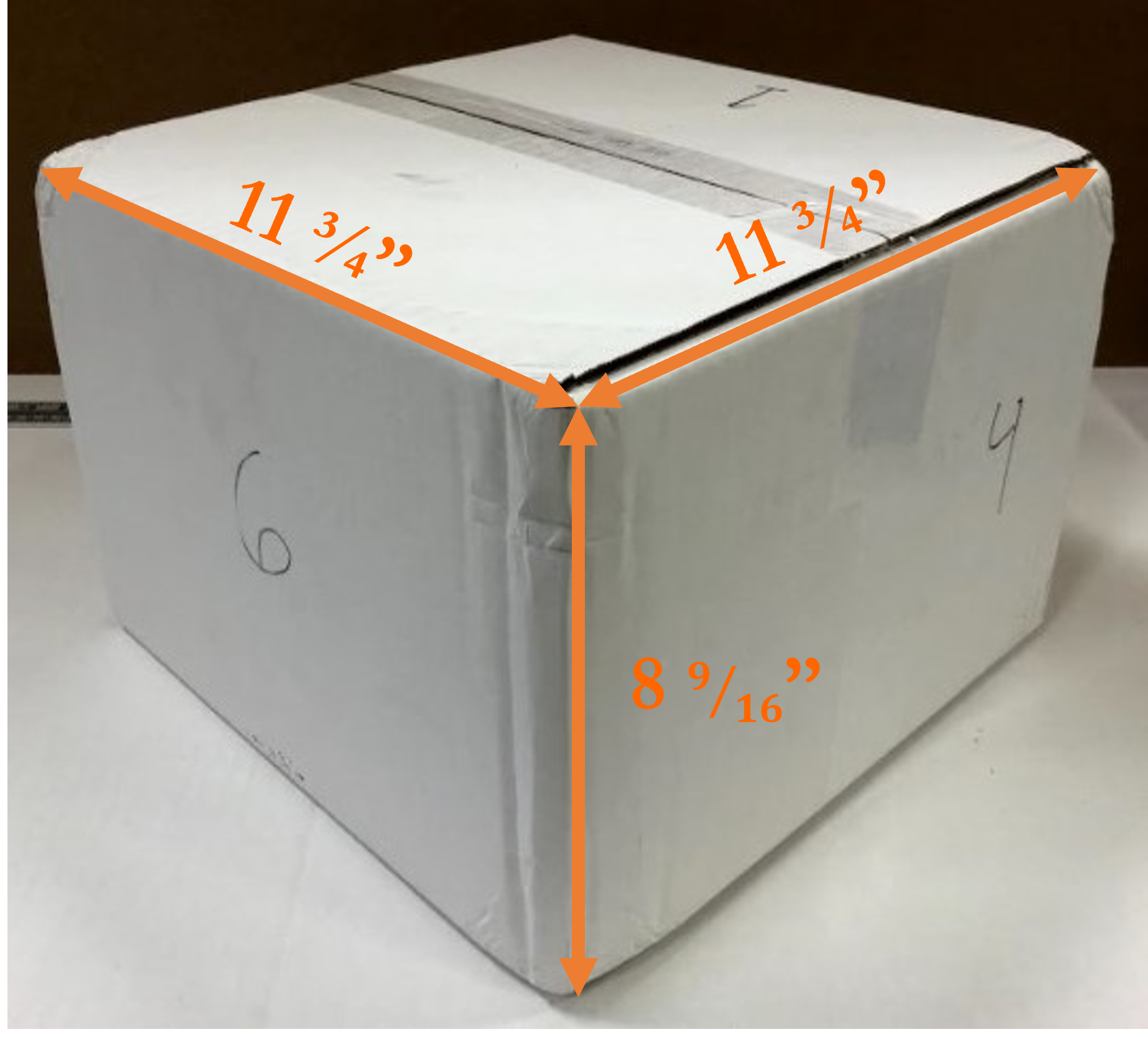A white box with dimensions overlaid on it.